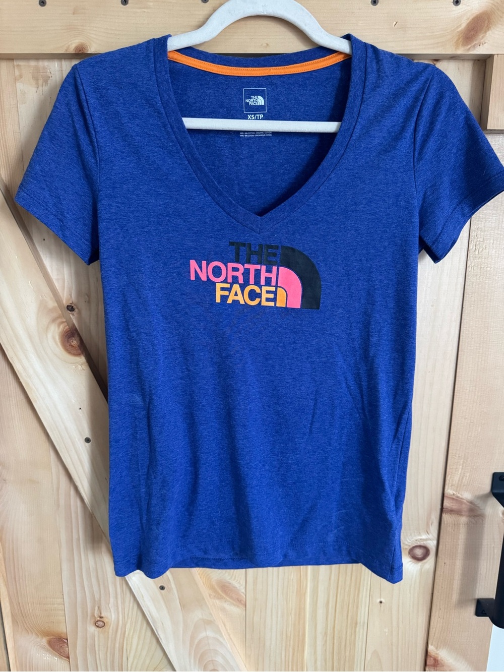 The North Face Women's Royal Blue V-Neck Tee with Multicolor Logo